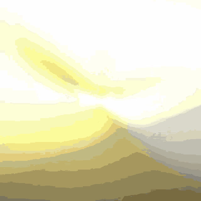 a blurred image of a light coming out of a tunnel