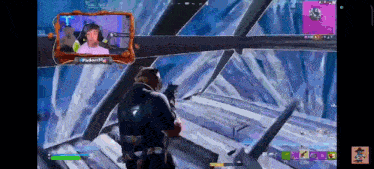 a video game screen shows a man holding a gun and a frame that says ' rabbit ' on it