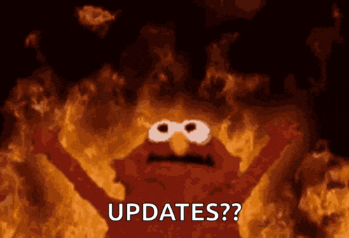 elmo is on fire and says " updates " in front of him