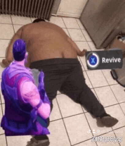 a fat man is laying on the floor with a sign that says revive on it .