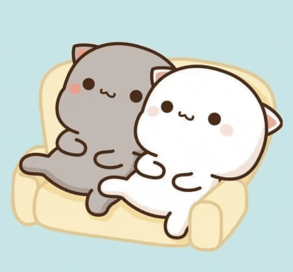 two cartoon cats are laying on a couch .