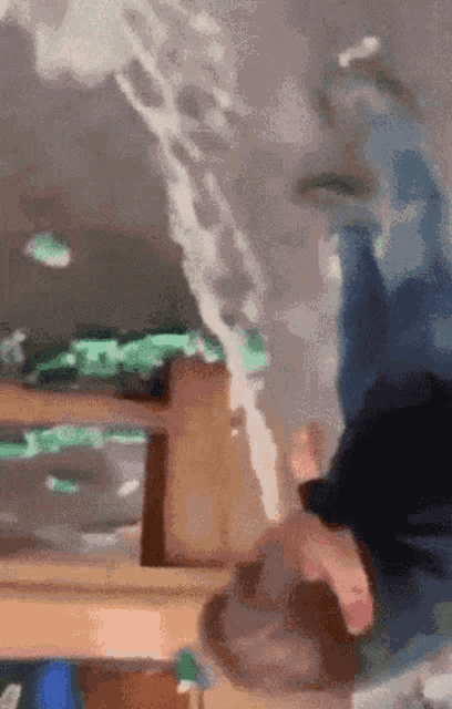 a person 's feet are visible in a blurry image