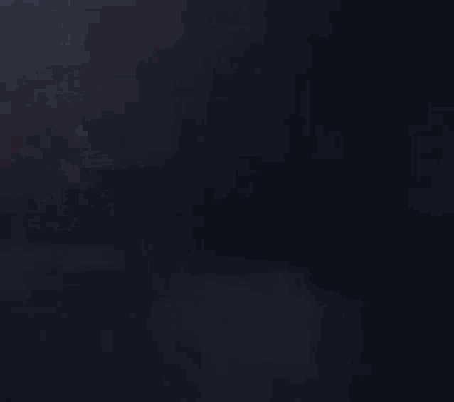 a cube with a red circle in the middle is being thrown into the air .