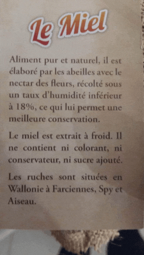 a paper that says le miel on it