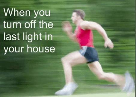 a blurry picture of a man running with a caption that says when you turn off the last light in your house