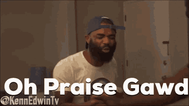 a man with a beard is wearing a white shirt that says ' oh praise gawa '