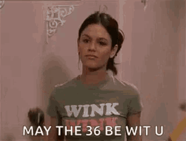 a woman is holding a drill and a wrench and says `` may the 36 be wit u '' .