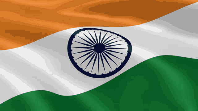 a close up of the flag of india with a blue center