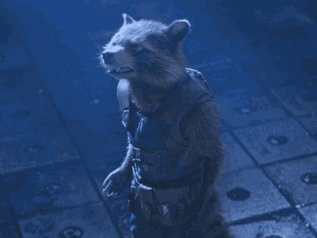 a raccoon wearing a vest and pants is standing on a tiled floor