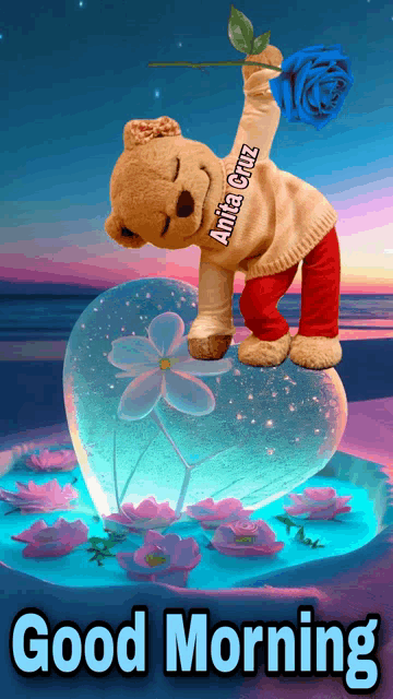 a teddy bear is holding a blue rose in front of a heart that says " good morning "