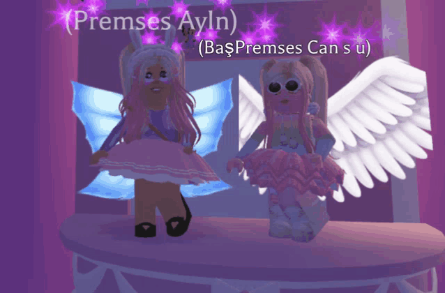 two girls with wings are standing next to each other with the name " presmes ayln " written above them