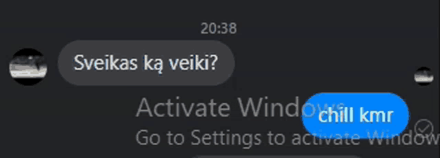 a screenshot of a text message with a blue button that says go to settings to activate window