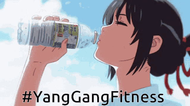 a girl drinking water from a plastic bottle with #yanggangfitness