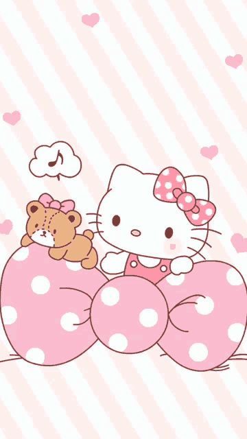 hello kitty is holding a teddy bear on a pink polka dot pillow