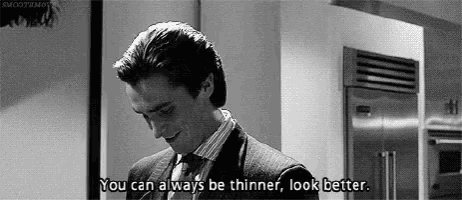 a man in a suit and tie is saying `` you can always be thinner , look better '' .