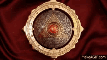 a makeagif.com screenshot of a circular object on a red background