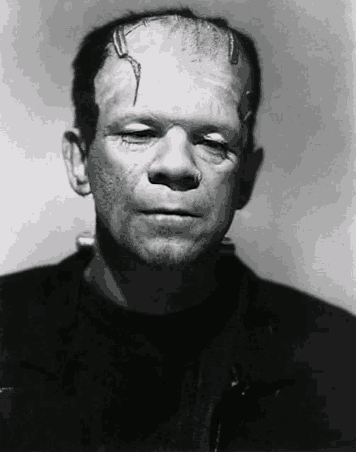 a black and white photo of a man with a broken head