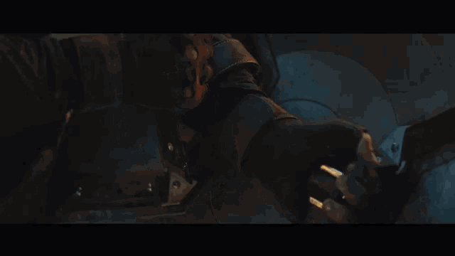 a close up of a man in a captain america costume