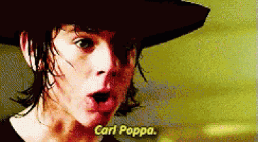 a close up of a person wearing a hat that says carl poppa on it