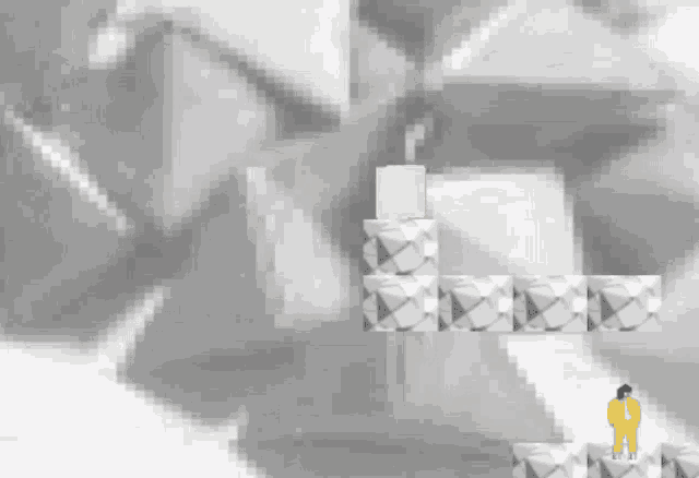 a pixelated image of a person standing on a stack of boxes