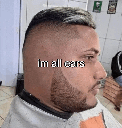 a man with a beard has the words im all ears written on his head