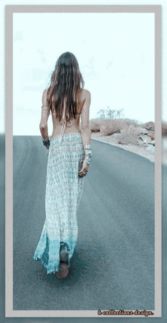 a woman in a blue and white dress is walking down a road with a border that says b-collections design