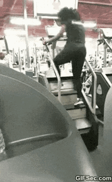 a woman is walking up the stairs of a treadmill .
