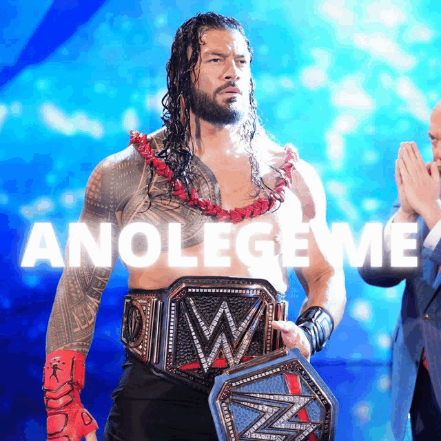 a wrestler holding a wrestling belt with the words anolegeme behind him