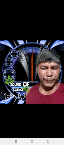 a man in a red shirt stands in front of a sound of silence logo