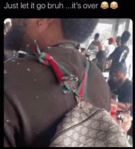 a picture of a man with a gucci backpack says just let it go bruh ... it 's over