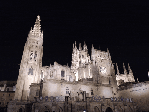 a large building with a sign that says ' catedral de burgos ' on the side