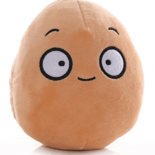 a stuffed animal that looks like a peanut with a face on it