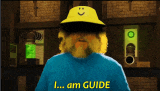 a man with a beard wearing a yellow hat and a blue shirt that says i am guide