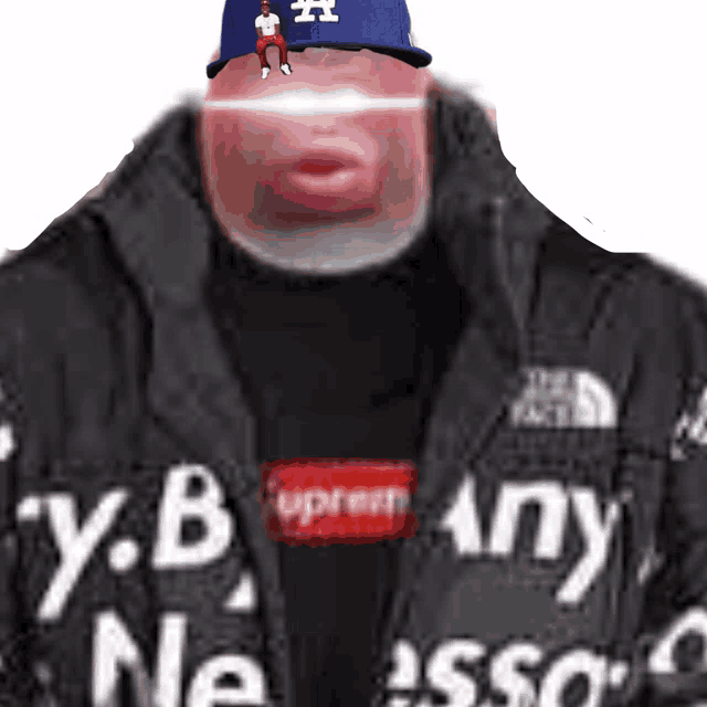 a man wearing a la dodgers hat and a jacket that says y.b. any