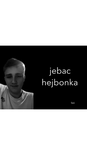 a black and white photo of a young man with the words " jebac hejbonka " on the bottom