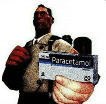 a man in a suit is holding a box of paracetamol .