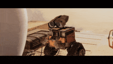 a wall e robot is sitting on a table