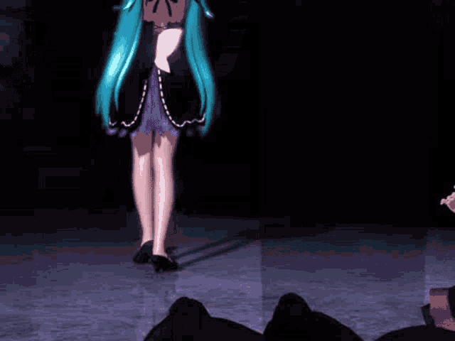 a cartoon character with blue hair is dancing on a stage in a dark room .