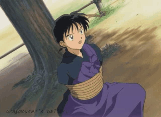 a boy in a purple dress is tied to a tree in a gray mouser 's gallery cartoon