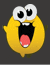 a yellow smiley face with big eyes and a red tongue is laughing .