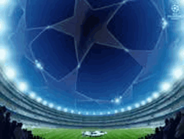 there is a soccer ball in the middle of a stadium with a star on it .