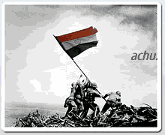 a black and white photo of soldiers raising an indian flag .