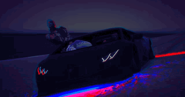 a man in a mask stands next to a car that has the letter v on the front of it