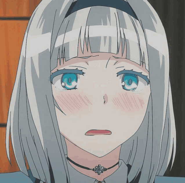 a girl with white hair and blue eyes looks sad