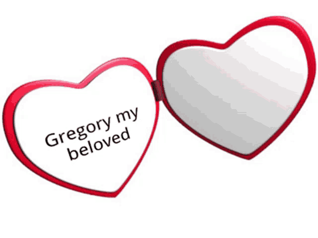 a heart shaped mirror that says gregory my beloved on it