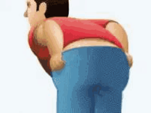 a cartoon man in a red shirt and blue jeans is holding his butt .