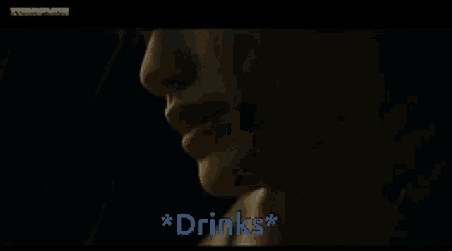 a man in a blue sweater says drinks in blue text