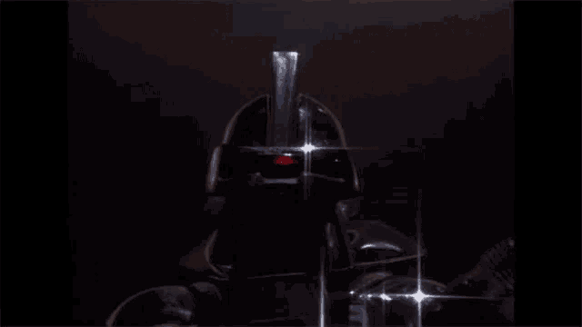 a close up of a person 's head with a sword in it