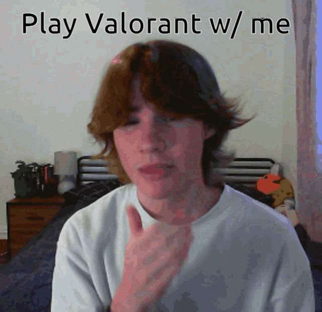 a young man says play valorant w / me in a bedroom