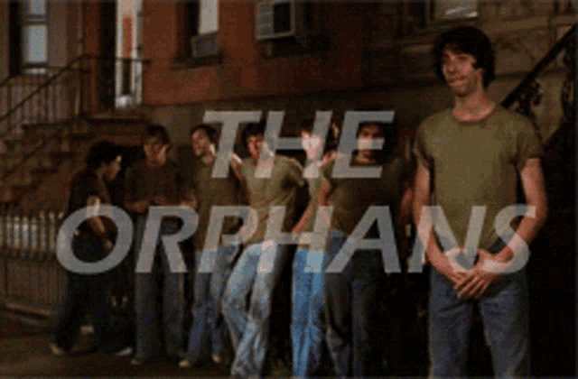 a group of young men are standing in front of a building with the words the orphans written on the bottom